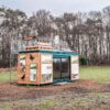 Afbeelding van een Natuurinformatiepunt in een container ergens in een bos.