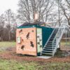 Afbeelding van een Natuurinformatiepunt in een container ergens in een bos.